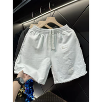 Shorts décontractés d'été pour hommes, style streetwear tendance, déchirés, respirants, taille élastique, brodés, style européen et américain, coupe ample