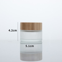 5 ml 10 ml 30 ml 50 ml 100 ml Couvercle en bambou Pot cosmétique Récipient en verre dépoli
