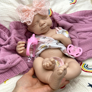 Poupées réalistes en silicone reborn, avec un blush naturel dégradé, un sourire apaisant pour les conseillers en deuil et la lutte contre l'isolement - Product Image 1