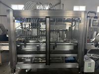 Machine de remplissage d'huile industrielle robuste pour l'automatisation de l'assemblage et du traitement sur lignes de production automatisées