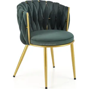Stylish comfy deep green woven velvet dining chair with golden metal frame