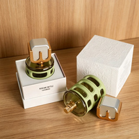Flacon de parfum en verre vert de 100 ml, design unique et creux, avec logo personnalisé en relief, conteneur cosmétique vaporisateur avec boîte cadeau