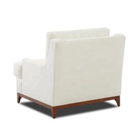 Canapé d'angle en cuir véritable et fauteuil d'appoint en tissu bouclé, design nordique italien moderne, pour projets hôteliers et appartements