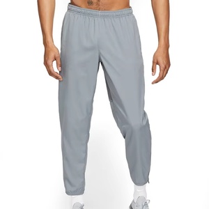 Pantalon de jogging OEM en nylon ultra fin, respirant, avec ceinture élastique et fermeture éclair, idéal pour l'été, la course et le fitness, vente en gros à prix abordable - Product Image 1