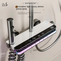 Ensemble de douche mural multifonction intelligent en laiton de luxe avec mitigeur, fonction pluie, lumière d'ambiance massante et affichage numérique