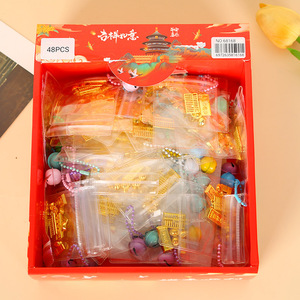 Mini Pendentif Doré Sac Rouge Chinois Compressible en PVC Jouet Anti-Stress pour Enfants 48 Pièces Jouets Fidget - Product Image 1
