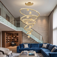 Lustre LED moderne de luxe multi-anneaux en cristal, intensité variable en 3 couleurs, suspension en acier inoxydable pour villa à plafond haut