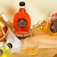 Bouteilles de sirop d'érable en verre Bouteilles en verre réutilisables transparentes de 5 oz Bocaux de sirop d'érable Conteneur pour cadeau de jus de lait avec couvercles Poignée à boucle