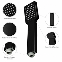 Pommeau de douche portable noir mat contemporain avec flexible tressé en acier inoxydable et support mural magnétique réglable pour l'hôtellerie