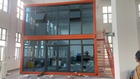 Maison conteneur préfabriquée détachable à faible coût, design moderne, caractéristique respirante pour bureau/hôtel/appartement/ferme