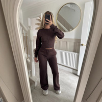 Ensemble deux pièces décontracté et tendance pour femme : crop top zippé à manches longues et pantalon de jogging avec cordon de serrage – Vente en gros