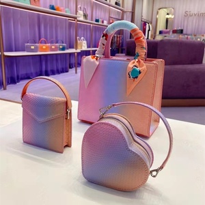 กระเป๋าถือผู้หญิงรูปหัวใจสไตล์งูเหลือมบุผ้าฝ้ายอินทรีย์สำหรับชายหาด - Product Image 6