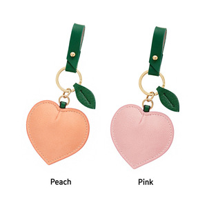 Porte-clés en cuir de luxe personnalisé en forme de cœur, couleur personnalisée, haute qualité, durable, porte-clés de voiture avec logo de marque en gros - Product Image 6