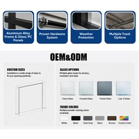 Porte de garage en verre commercial avec cadre en aluminium, panneaux transparents, dimensions personnalisées et quincaillerie sectionnelle durable