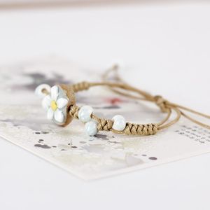 Bracelets rustiques faits main en corde cirée, style bohème, avec breloques florales en céramique (fleurs et feuilles) - Product Image 4