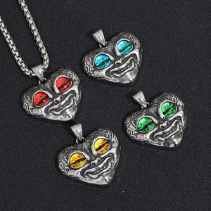 Yunnique – collier avec pendentif œil maléfique, visage de satan, en acier inoxydable, yeux rouge, bleu, vert, jaune, bijoux punk unisexes, design géométrique - Product Image 1