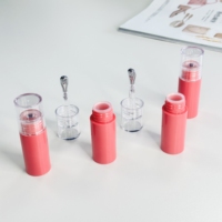 Emballage cosmétique récipient de rouge à lèvres liquide rond vide lèvre glaçure bouteille tube de brillant à lèvres avec applicateur en métal