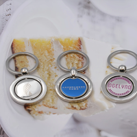 Porte-clés flottant en métal souvenir personnalisé avec rotation rotative et logo en métal Porte-clés imprimé époxy en alliage d'acier inoxydable et d'argent
