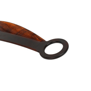 Mini calzador de plástico portátil y compacto para uso doméstico, para ponerse zapatos - Product Image 1
