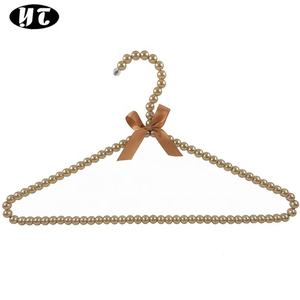 YT 2023 vendita calda bella moda moderna lucida fatta a mano appendiabiti da sposa perla per esposizione in boutique - Product Image 1