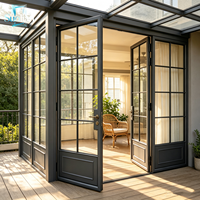 Porte double française moderne en aluminium avec double vitrage et cadre fin pour usage extérieur, villa, patio, jardin, isolation thermique