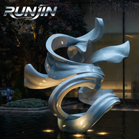 Sculpture de fontaine d'eau moderne en acier inoxydable soudé, motif ruban torsadé abstrait, éclairée, pour aménagement paysager, fabricant sur mesure