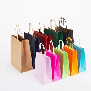 卸売エコ再利用可能生分解性キャリークラフトブティックギフトショッピング包装ピンクブラウンクラフト紙袋リボンハンドル付き