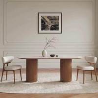 Table à manger moderne en bois de style français, plateau en pierre frittée, petite table ovale en noyer pour appartement, design hôtelier stable, style Wabi-sabi