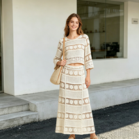 Ensemble deux pièces en crochet ajouré floral 3D pour femme, jupe midi, collection été 2026 – OEM/ODM – Ensembles tricotés au crochet pour femme