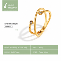 Bague double boucle en zircon plaqué or 14 carats pour femme avec motif croisé et ensemble de fleurs jumelles orné d'accentuations rondes transparentes