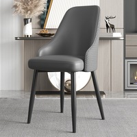 Chaise de salle à manger moderne en métal italien avec revêtement en cuir, dossier de luxe léger, pieds en fer, usage domestique, garantie 1 an Yuke