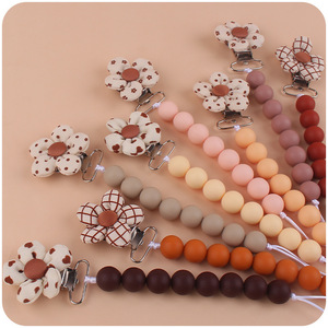 Clip para chupete de bebé con cuentas florales de silicona, sin BPA, de 0 a 12 meses, diseño recto y redondo para uso infantil - Product Image 1