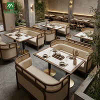 Mobilier commercial pour restaurants : banquette en rotin et chaise de café avec table en pierre pour hôtels et restaurants d'Asie du Sud-Est