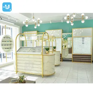 Marco de acero inoxidable dorado para gafas, diseño de tienda Interior, personalizado, mármol, vitrina de exhibición para tienda óptica de moda