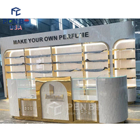 Vitrine de présentation de parfums LED haut de gamme de style arabe, personnalisable, écologique, recyclable, robuste, pour kiosque de centre commercial