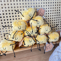 Fabricant de peluches personnalisées en gros, vente en gros de petites peluches mignonnes et douces en peluche beurre, pendentifs de sac à dos, porte-clés et jouets en peluche