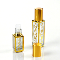 Flacon roll-on carré en verre de luxe personnalisé de 12 ml pour parfum et crème pour le visage avec bille en verre gravée carrée