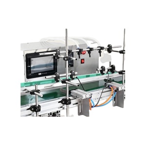 เครื่องบรรจุของเหลวอัตโนมัติแบบหัวเล็ก CNC สำหรับน้ำหอมและของเหลวชนิดรับประทาน บรรจุแบบต่อเนื่อง - Product Image 2