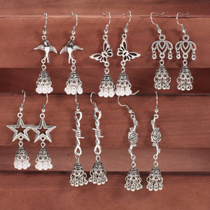 Pendientes colgantes chapados en plata vintage bohemios con perlas de imitación para mujer, joyería de fiesta, mariposa, estrella, campana, animal, flor - Product Image 2