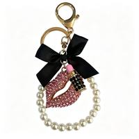 Nouveautés Style Designer Porte-clés en métal avec pendentif lèvre incrusté de diamants et strass, tridimensionnel, pour sac à rouge à lèvres, petit modèle