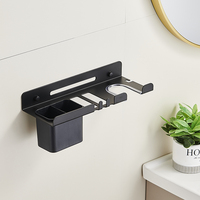Herstellerdirektverkauf Einfacher Haartrockner-Aufbewahrungsständer Wandmontierter Badezimmer-Haartrocknerhalter mit Bohrinstallation