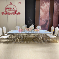 Ensemble table à manger rectangulaire 12 places avec base en métal moderne en acier inoxydable argenté et chaises de luxe pour salle à manger