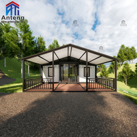 Maison conteneur extensible pour vacances en plein air avec terrasse et auvent, entièrement meublée, préfabriquée, deux chambres, maison d'hôtes familiale