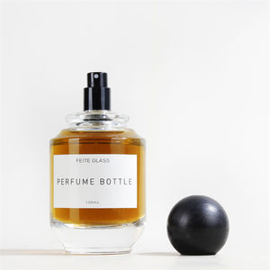 नई डिजाइन लक्जरी राउंड आकार 100 एमएल ग्लास इत्र की बोतल लकड़ी की गेंद कैप के साथ - Product Image 4