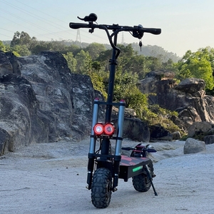 Scooter Eléctrico Plegable para Adultos de 60V con Doble Motor, Batería de 38Ah, Alcance de 63-75 Millas, 11 Pulgadas, Todoterreno, Hidráulico - Product Image 1