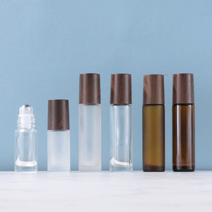 10ml Dark-Colored Cylinder Glass Bottle Blue Moving Balls Transparent Frosted Design Silk Screen Printed <b>Eye</b> Cream Brownessentia - Product Image 1