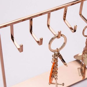 Présentoir suspendu moderne argenté et doré avec décoration de vitrine, support de rangement pour bijoux pour mobilier de magasin - Product Image 6