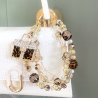 Chaîne de téléphone portable en perles léopard et strass, décoration de sac, porte-clés de luxe DIY personnalisable, vente en gros
