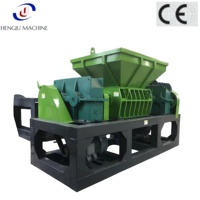 Broyeur industriel double à couple élevé pour la recyclage des déchets métalliques, des tuyaux en plastique, du bois et des pneus, avec démarrage et arrêt automatiques