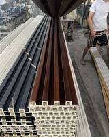 Panneau mural en WPC anti-eau à prix avantageux, co-extrusion, grille, façade, pour mur extérieur